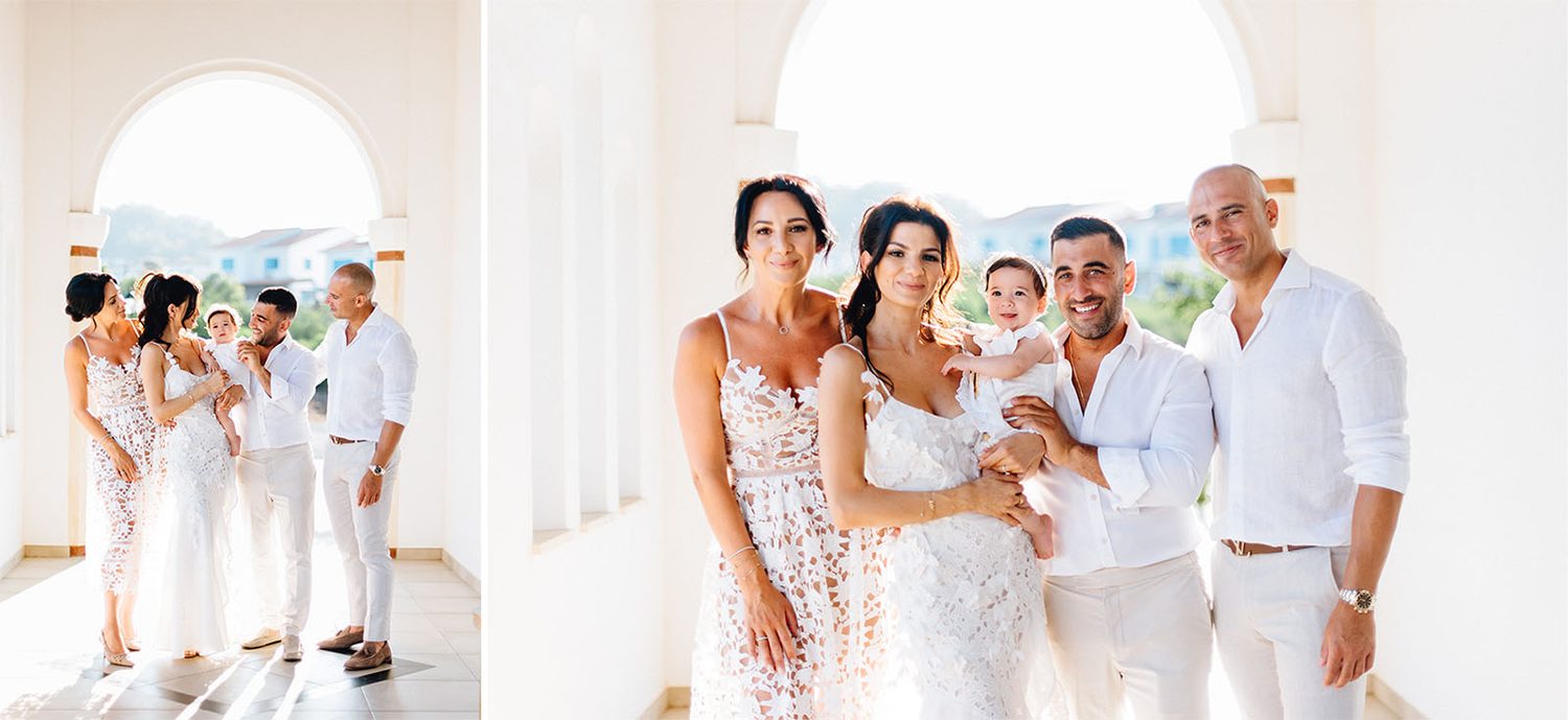 Family portrait in white under the arches of the Chapel of St. Andreas, Protaras