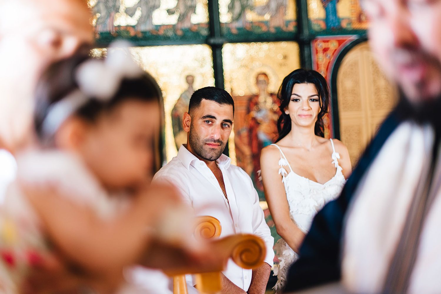 Parents and godparents during the christening at St. Andreas Chapel, Protaras
