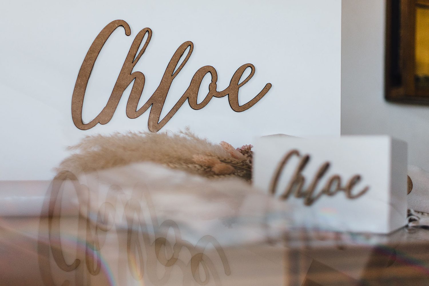 Chloe name sign with pampas grass, christening details in Protaras
