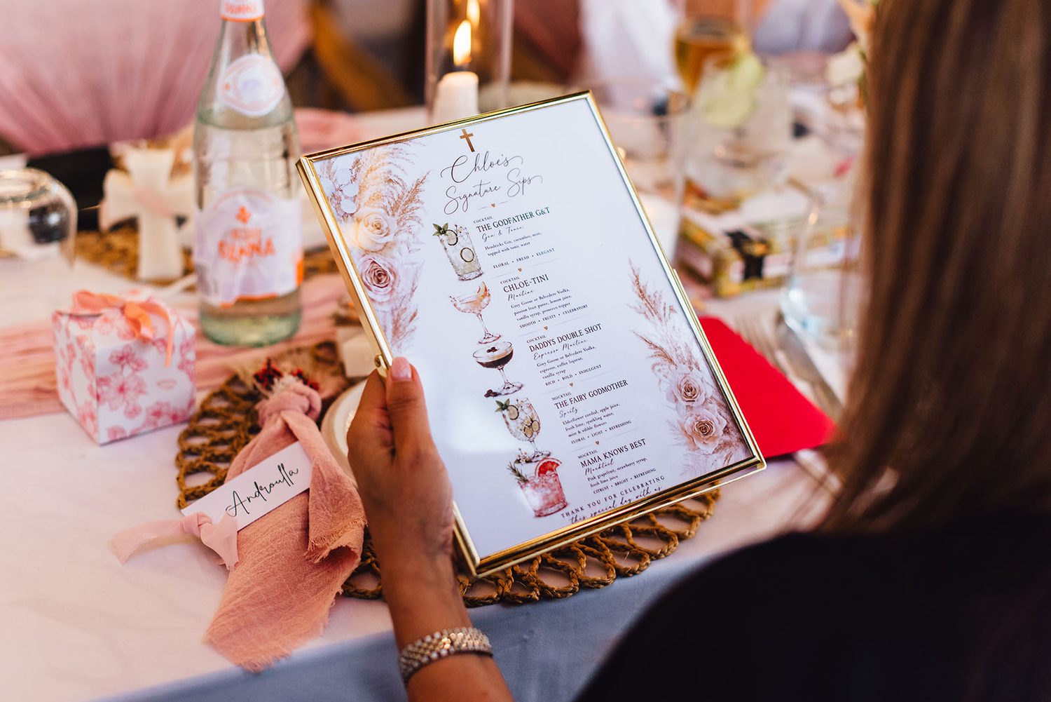Guest reading the christening drink menu at Elia restaurant, Protaras
